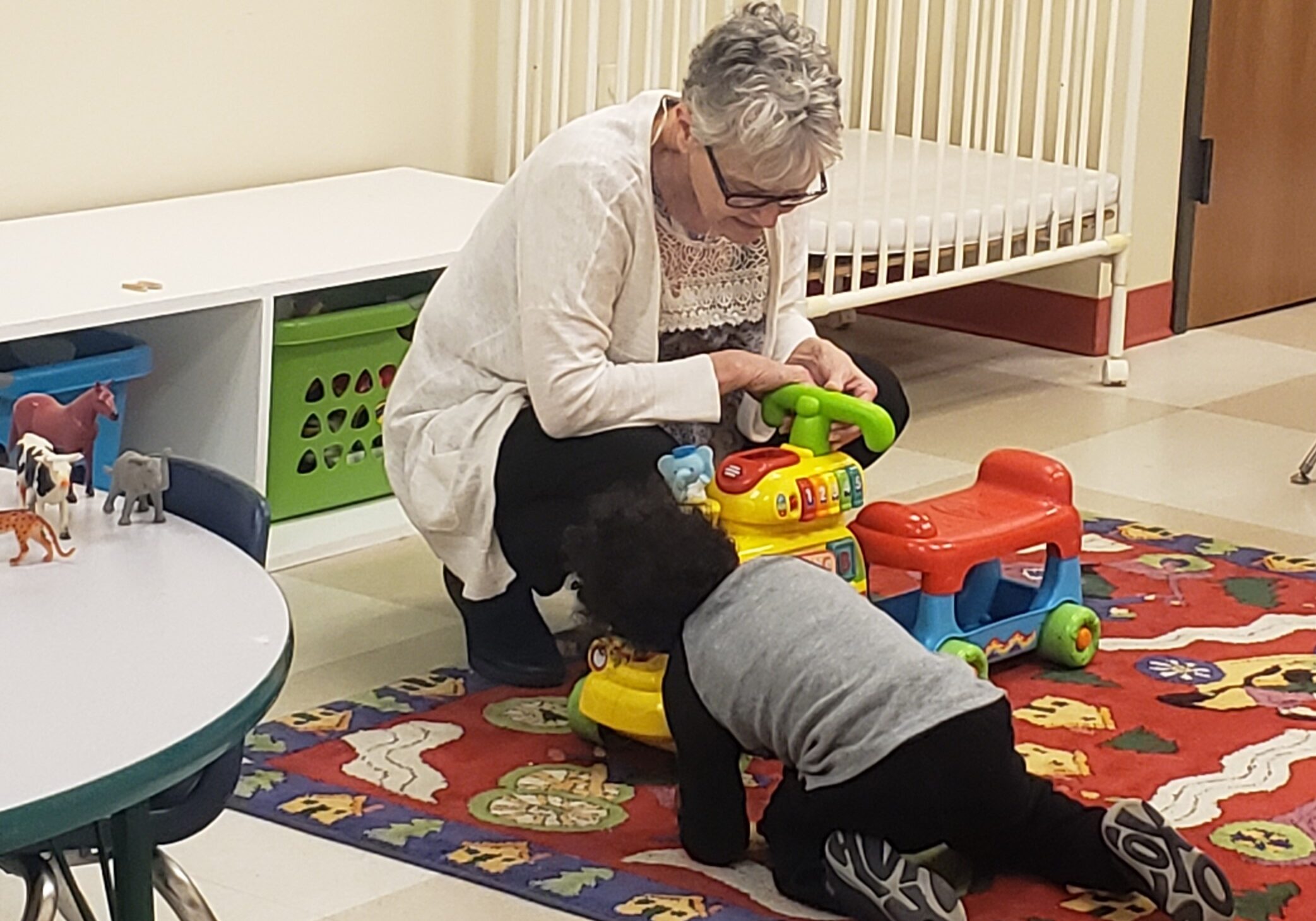 Rose and Joshua in the toddler room